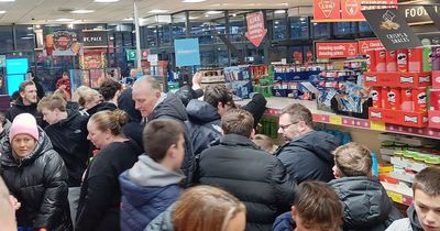 Aldi apologises as adults push kids to grab Prime energy drink in supermarket 'carnage'
