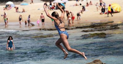 Novocastrians flock to the beaches to ring in the New Year