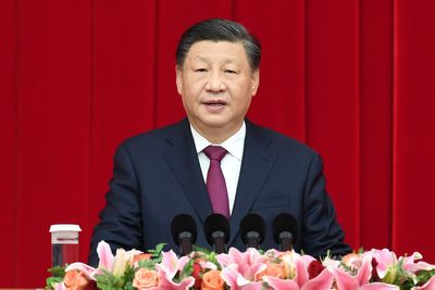 Troubles aside, Xi says China on 'right side of history'