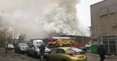 Emergency services rush to Rutherglen street to battle huge building blaze