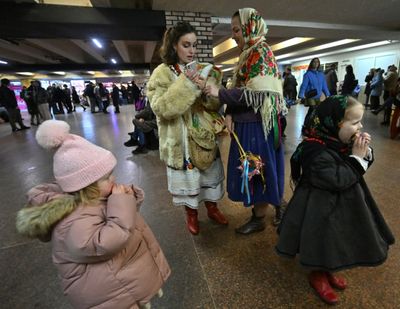 Ukraine clings to holiday vibe despite New Year strikes