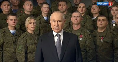 Coughing Vladimir Putin delivers New Year rant against West 'flanked by actors'