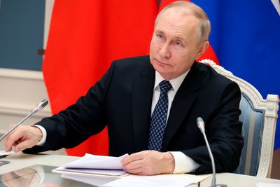 Putin accuses West of using Ukraine to destroy his country as Russia launches latest missile salvo