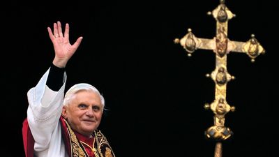 Why did Emeritus Pope Benedict XVI resign, and how common is it for Catholic popes to quit?