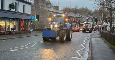 Watch as over 100 tractors drive through the streets to remember a much-loved farmer