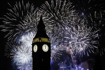 Jubilant UK crowds celebrate restriction-free new year for first time since Covid pandemic