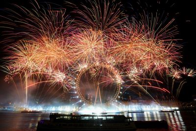 World welcomes 2023 and leaves a stormy year behind