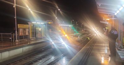 Car finds its way on to tram tracks and pulls up at Metrolink station