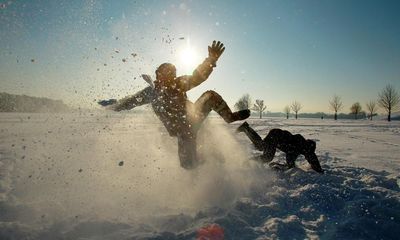 A snow day delights my son – until he falls over