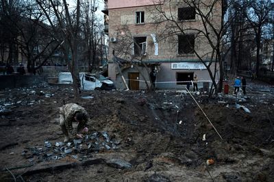 Russia's New Year raids on Ukraine kill three, wound dozens