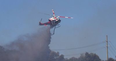 Large grass fire burning at Boolarooo, firefighters on the scene