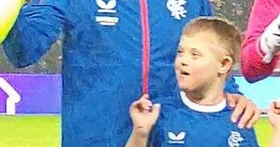 Rangers-daft schoolboy with Down's syndrome ditched wheelchair to lead team out at Ibrox