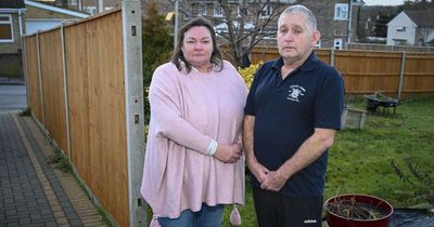 Couple ordered to cut £10,000 fence in half after complaints from neighbours