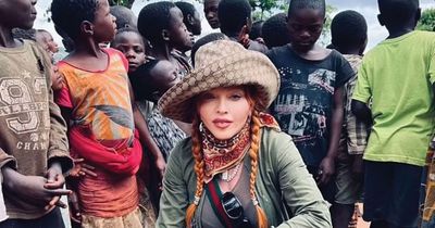 Madonna wears head-to-toe Gucci as she visits Malawi where four of her children were born