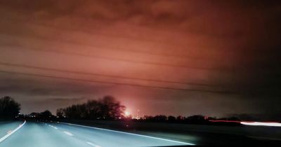 'Pulsing' lights turn sky bright orange over Merseyside