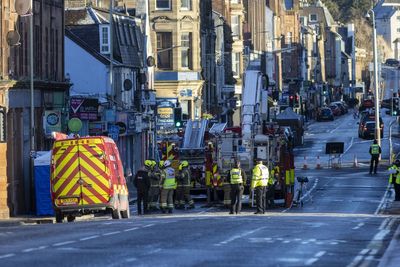 Three people and dog reported dead in early-morning hotel blaze - OLD