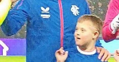 Rangers-mad schoolboy with Down’s syndrome ditches wheelchair to lead team out at Ibrox