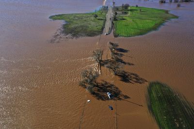 California keeps wary eye on flooding after powerful storm