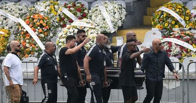 Emotional Brazilians say tearful goodbye to Pele as fans flock to legend's funeral