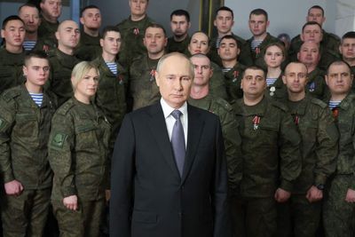 Putin accused of using same woman in multiple photo-ops