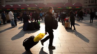 China hits back at traveller restrictions imposed in more than a dozen countries amid COVID-19 surge