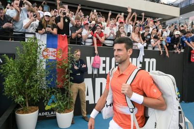 Djokovic romps in first singles clash in Australia since deportation