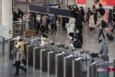 Subway traffic rise hints at Covid peak in China