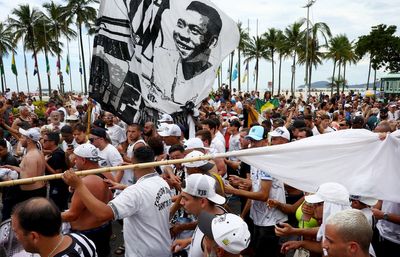 Pele funeral – live: Football legend transported to cemetery after funeral in Santos