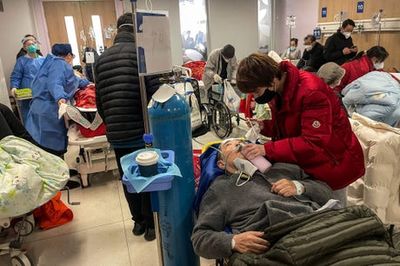 Up to 70% of Shanghai residents have been infected with Covid, top doctor says as hospitals ‘flood’ with cases