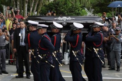 Pele funeral live updates: Brazil football legend laid to rest after thousands line streets
