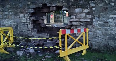 Edinburgh driver careers off icy road and leaves gaping hole in cemetery wall
