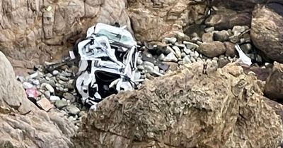 Car plunges 250ft off cliff with two adults and two children surviving the fall