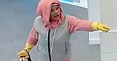 Woman in marigolds sought by police after attempted bank robbery