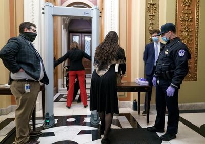 GOP pull down Capitol metal detectors after its members were fined thousands for dodging them