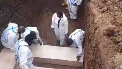 Port Moresby hospital buries unclaimed bodies in mass grave after viral video shows overflowing morgue