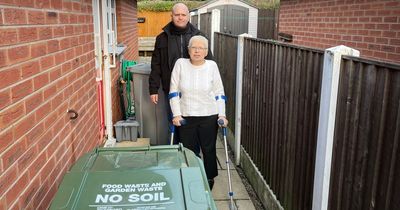 Woman forced to CRAWL back into her home after her bin was dumped