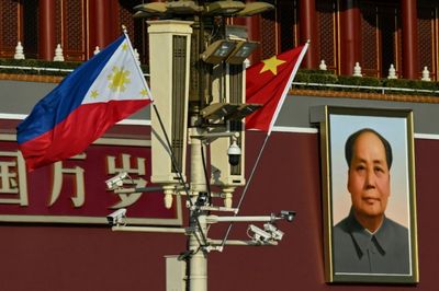 China, Philippines vow 'friendly' handling of maritime spats