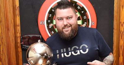 Michael Smith admits not sleeping after World Darts triumph as he returns to mum’s bar