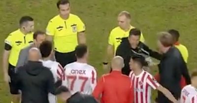 Former Liverpool star rushed to protect referee from his own players