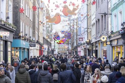 Christmas shoppers provide boost despite rail strikes and cost-of-living crisis