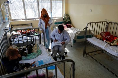Afghan hospital wards fill with children suffering from pneumonia