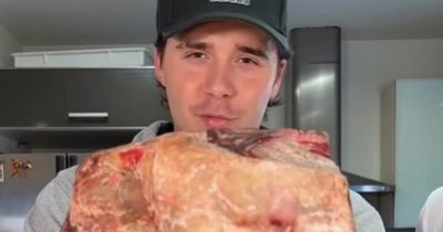 Brooklyn Beckham slammed for meat that's still 'grazing' in Sunday roast cooking tutorial