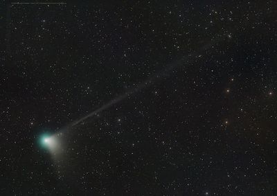 Look up! A bright green comet unseen since the Neanderthals blazes in the night sky this month