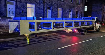 Van driver caught trying to move load that was 'longer than a bus'