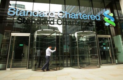 Standard Chartered shares jump as much as 20% after First Abu Dhabi Bank takeover report