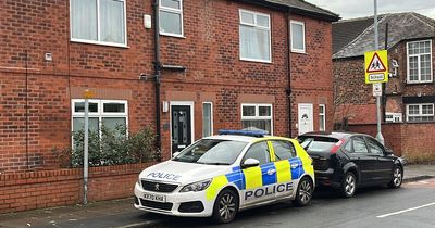 Police scrambled to Greater Manchester street after reports of man making threats and 'carrying blade'