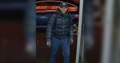 Shop worker punched as men raid till and run off