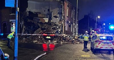 Home collapses after car smashes into it with woman arrested