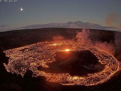 Hawaii's Kilauea volcano erupts again as the summit crater glows