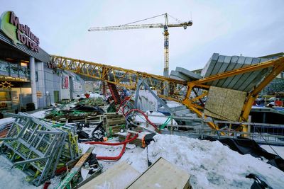 Crane crashes onto mall in Norway amid high winds; 1 injured